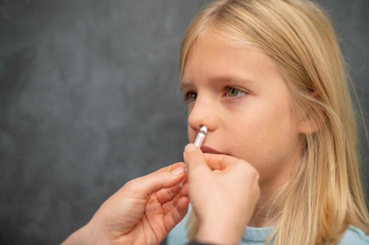 Nasal vaccines for COVID-19 are still in early development. <a href="https://www.gettyimages.com/detail/photo/little-cute-blonde-boy-getting-vaccinated-covid-19-royalty-free-image/1282728128?phrase=COVID-19%20nasal%20vaccine&adppopup=true" rel="nofollow noopener" target="_blank" data-ylk="slk:Paul Biris/Moment via Getty Images;elm:context_link;itc:0;sec:content-canvas" class="link ">Paul Biris/Moment via Getty Images</a>