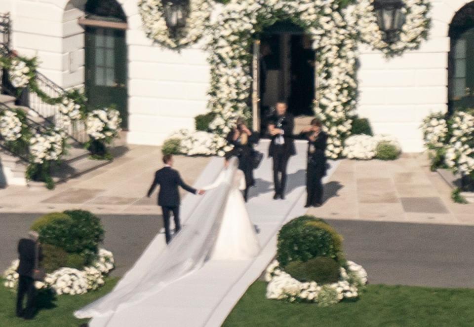 President Joe Biden's granddaughter Naomi Biden and her fiance, Peter Neal, are married on the South Lawn of the White House in Washington, Saturday (AP)