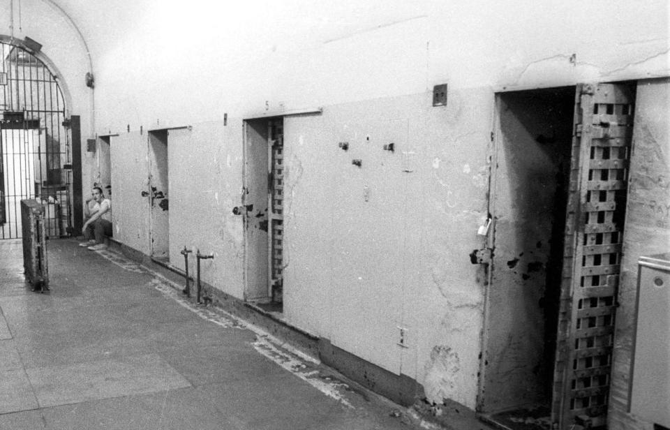 Foreboding, windowless cells line the corridor of the former Bucks County prions in Doylestown.