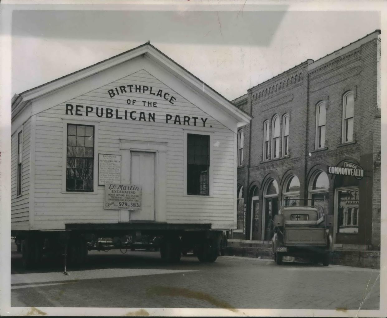 The Little White Schoolhouse, in which the Republican Party was founded in 1854, is transported from the Ripon College campus to a site on the grounds of the Republican Education Foundation in 1852. The schoolhouse would move again, for a fourth time in 2023.