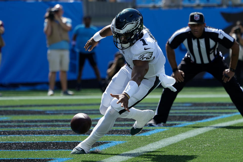 Philadelphia Eagles quarterback Jalen Hurts chases a fumble into the end zone against the Carolina Panthers during the first half of an NFL football game Sunday, Oct. 10, 2021, in Charlotte, N.C. Carolina Panthers defensive back Sean Chandler recovered the ball for a safety. (AP Photo/Jacob Kupferman)