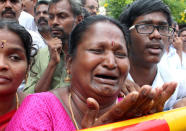 A well wisher of Tamil Nadu Chief Minister Jayalalithaa Jayaraman cries outside a hospital where Jayalalithaa is being treated in Chennai, India, December 5, 2016. REUTERS/Stringer