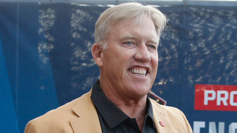 Former NFL player John Elway is introduced before the induction ceremony at the Pro Football Hall of Fame, in Canton, OhioHall of Fame Football, Canton, USA - 03 Aug 2019.