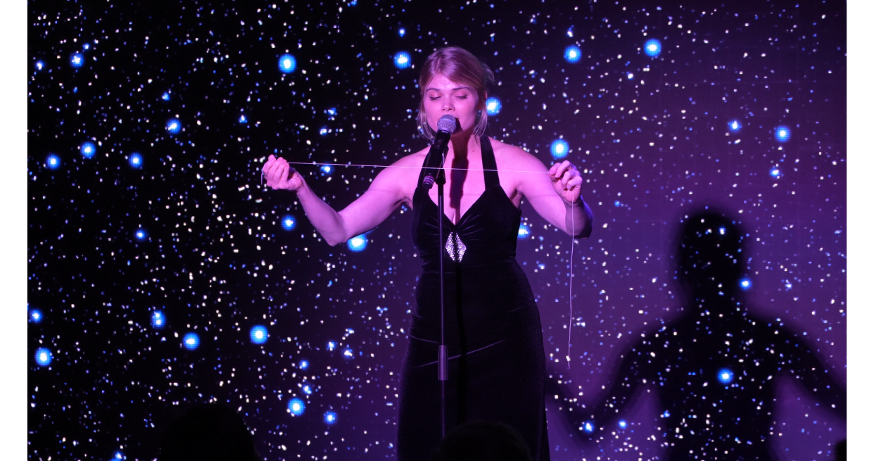 Liberty Larsen, whose family founded the Magic Castle, performing during the Conjurer's Cruise.