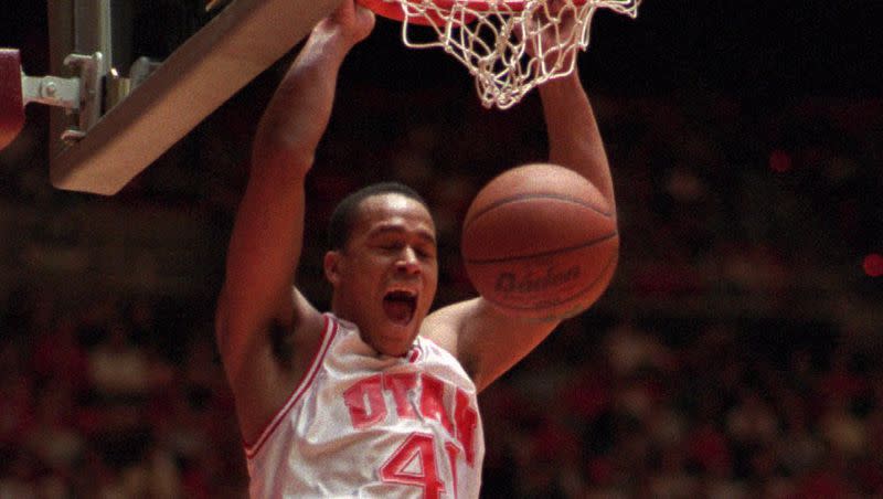 Utah’s Brandon Jessie dunks during a game. Jessie died at the age of 48.