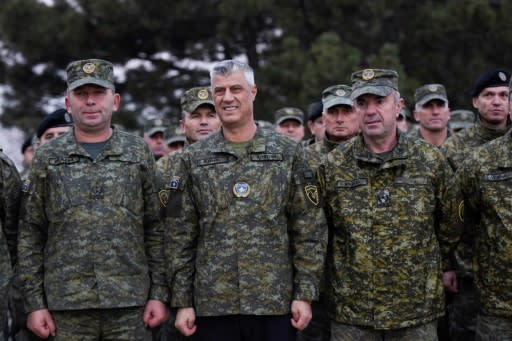 Kosovar President Hashim Thaci, seen here without a hat, told soldiers 'congratulations on your new assignments!'