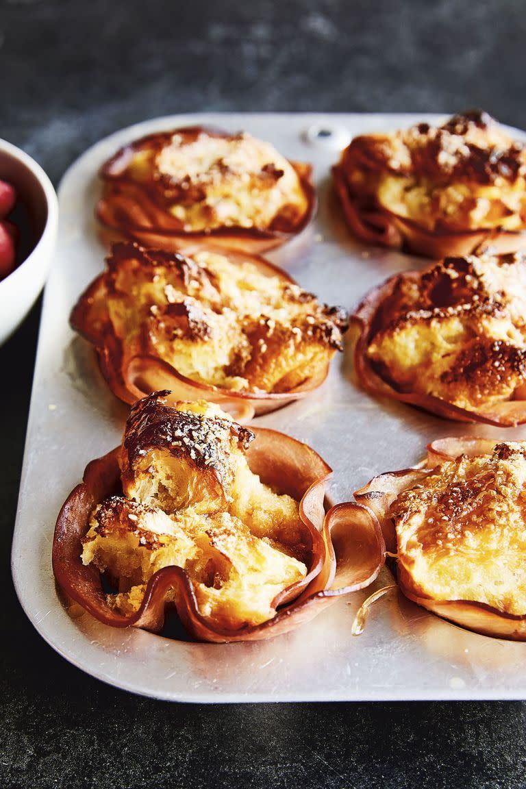 <p>Crunchy demerara sugar tops off these ham cups for a sweet-and-savory combo in this craveworthy Chrissy Teigen recipe.</p><p><em><a href="https://www.goodhousekeeping.com/food-recipes/a25889667/chrissy-teigen-croissant-bread-pudding-ham-cups-recipe/" rel="nofollow noopener" target="_blank" data-ylk="slk:Get the recipe for Croissant Bread Pudding Ham Cups »;elm:context_link;itc:0;sec:content-canvas" class="link ">Get the recipe for Croissant Bread Pudding Ham Cups »</a></em></p>