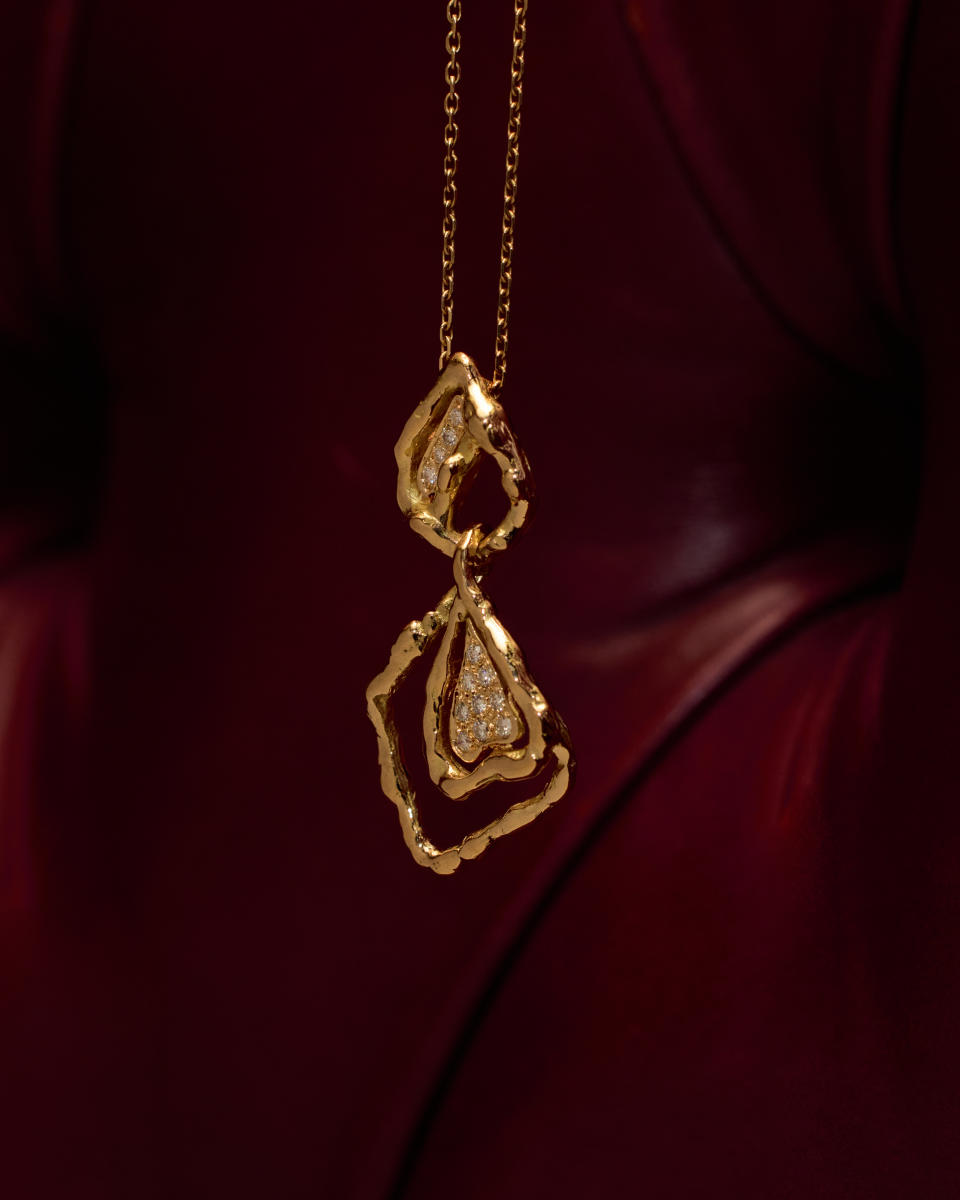 a yellow gold and diamond heart pendant from Chaumet