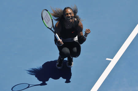 Serena Williams celebrates winning her quarter-final match against Britain's Johanna Konta. REUTERS/Jason Reed