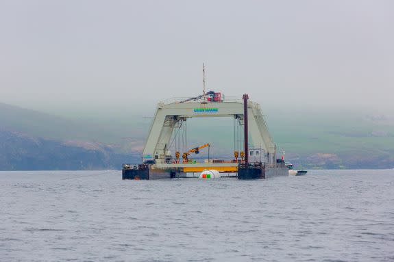 The Project Natick datacenter gets lowered into the waters of the Scottish coast.