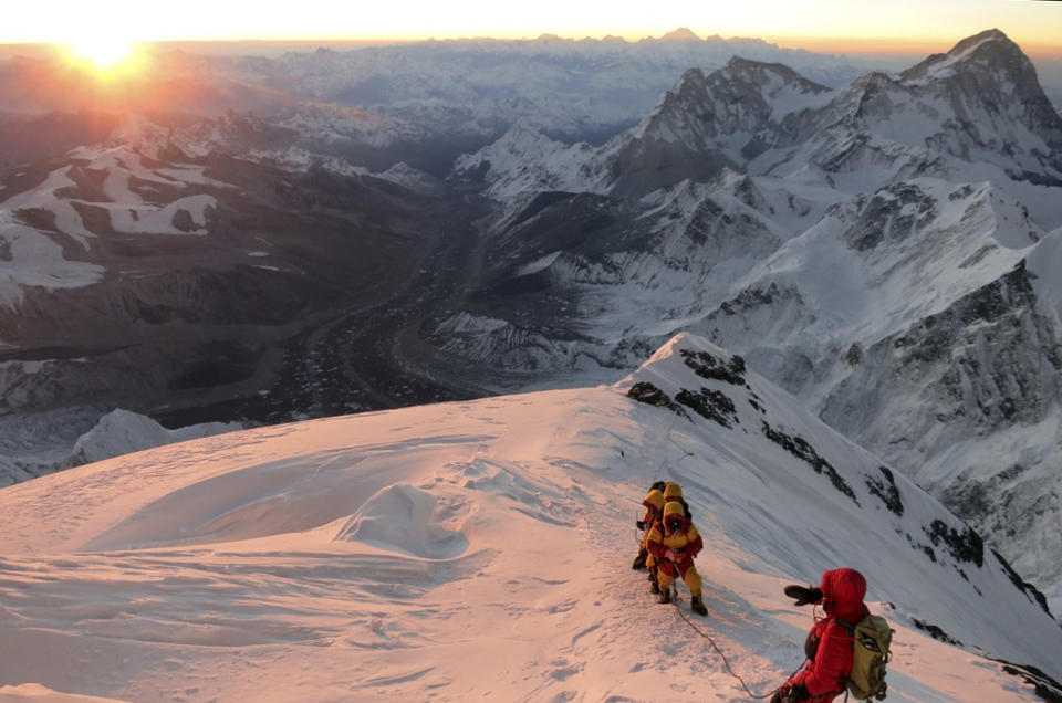 FILE - In this May 18, 2013 file photo released by mountain guide Adrian Ballinger of Alpenglow Expeditions, climbers make their way to the summit of Mount Everest, in the Khumbu region of the Nepal Himalayas. An avalanche swept down a climbing route on Mount Everest early Friday, April 18, killing at least 12 Nepalese guides and leaving three missing in the deadliest disaster on the world's highest peak. (AP Photo/Alpenglow Expeditions, Adrian Ballinger, File) MANDATORY CREDIT, EDITORIAL USE ONLY