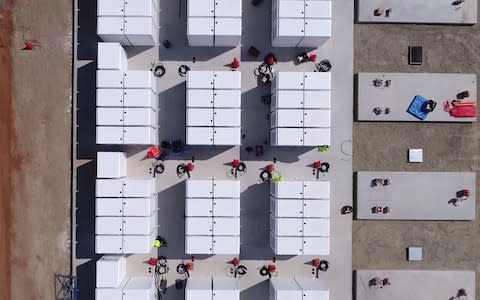 The world's biggest battery was officially launched in Australia on Friday - Credit: AFP