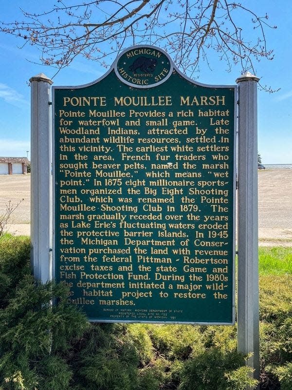 The Michigan Historical Marker for Pointe Mouillee is pictured.