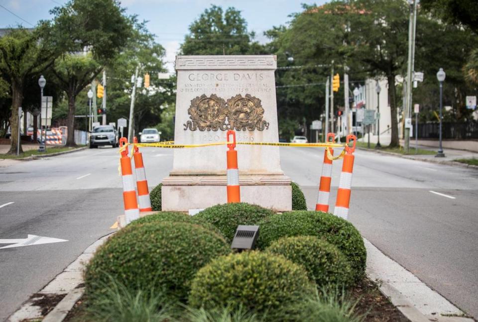 The pedestal on which the statue of Confederate senator and lawyer George Davis stood in downtown Wilmington, N.C. sits empty on Thursday, June 25, 2020. Two Confederate statues were removed from their pedestals in the port city overnight after Wilmington Police Chief Donny Williams announced on Wednesday that three officers would be fired for making racist and threatening comments that were caught on a dash cam video seen during an audit.