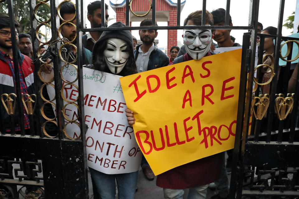 Demonstrators wearing Guy Fawkes masks arrive to attend a protest rally against a new citizenship law, in Kolkata, India, December 20, 2019. REUTERS/Rupak De Chowdhuri