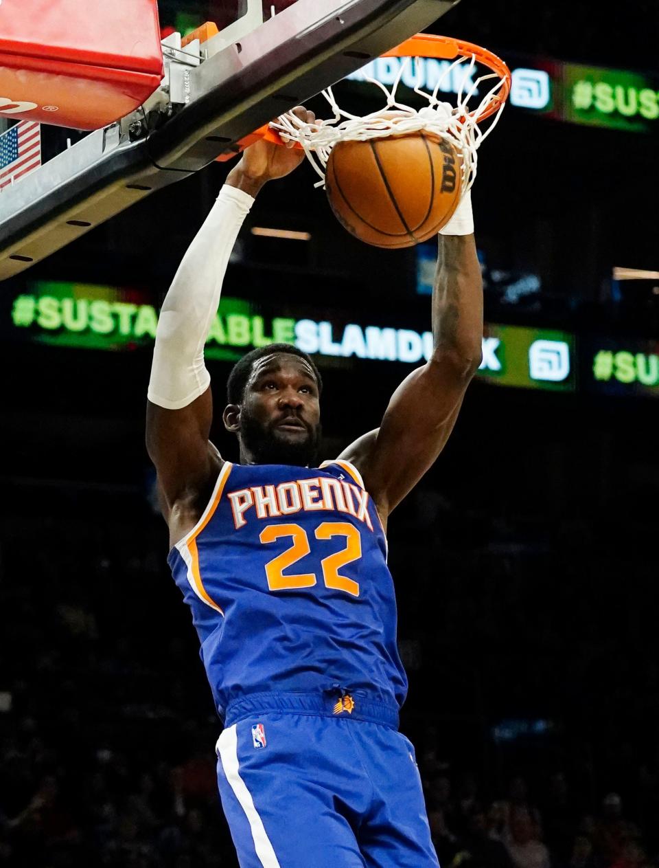 Dec 19, 2021; Phoenix, Arizona, USA; Phoenix Suns center Deandre Ayton (22) dunks the ball against the Charlotte Hornets at Footprint Center.