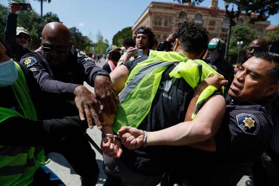 A protester is detained at California’s USC (EPA)