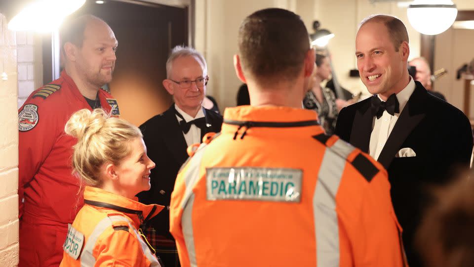 William chats with with Air Ambulance pilots, doctors and paramedics on Wednesday evening. - Daniel Leal/Getty Images