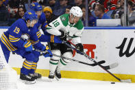 Dallas Stars center Max Domi (18) is pressured by Buffalo Sabres center Peyton Krebs (19) and defenseman Ilya Lyubushkin (46) during the second period of an NHL hockey game Thursday, March 9, 2023, in Buffalo, N.Y. (AP Photo/Jeffrey T. Barnes)