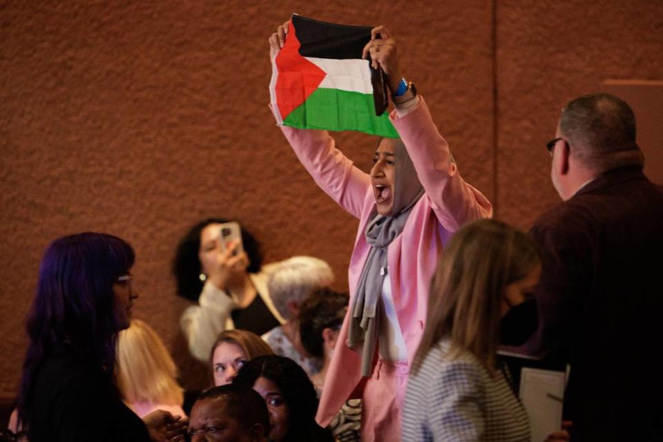 A protester holding a Palestinian flag disrupts Vice President Kamala Harris as she speaks at the Mexican Heritage Plaza in San Jose during her nationwide “Fight for Reproductive Freedoms” tour event on Monday. Dai Sugano/Bay Area News Group