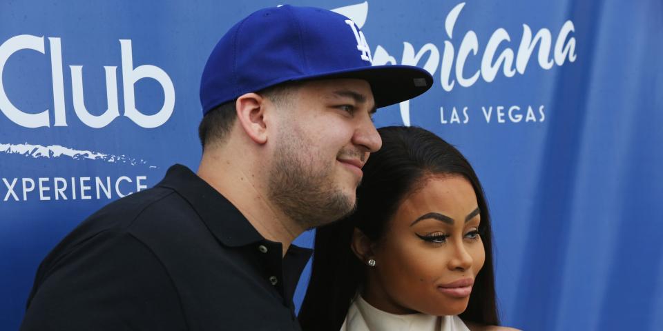 Rob Kardashian and Blac Chyna pose for a photo.