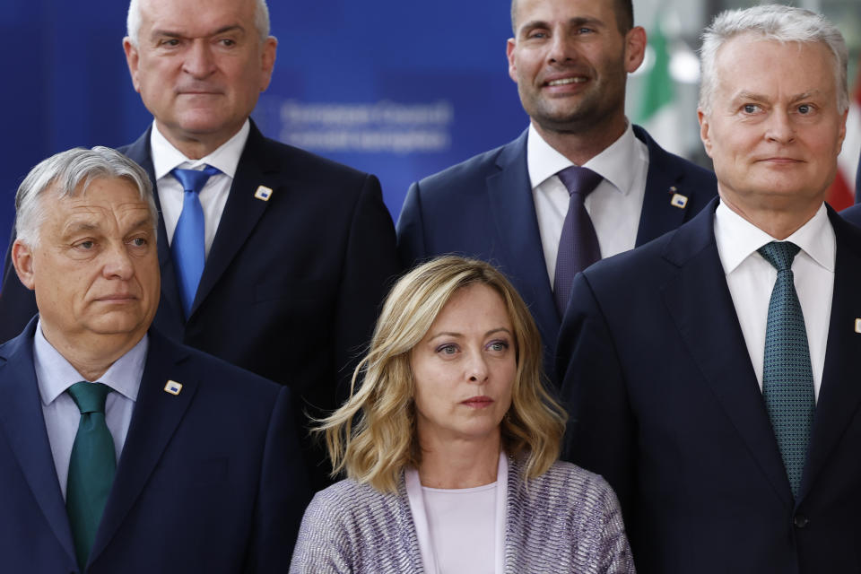 From left, Hungary's Prime Minister Viktor Orban, Bulgaria's Prime Minister Dimitar Glavchev, Italy's Prime Minister Giorgia Meloni, Malta's Prime Minister Robert Abela and Lithuania's President Gitanas Nauseda pose during a group photo at an EU summit in Brussels, Thursday, June 27, 2024. European Union leaders are expected on Thursday to discuss the next EU top jobs, as well as the situation in the Middle East and Ukraine, security and defence and EU competitiveness. (AP Photo/Geert Vanden Wijngaert)