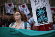 <p>People listen to a speech during a rally about the U.S. Supreme Court’s decision to uphold President Donald Trumpâs ban on travel from several mostly Muslim countries, Tuesday, June 26, 2018, in New York. (Photo: Andres Kudacki/AP) </p>