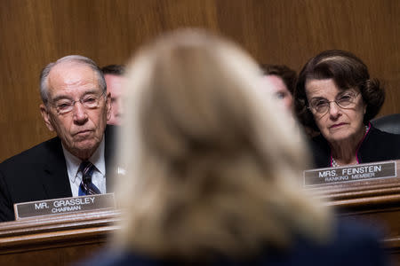 Chairman Charles Grassley, R-Iowa, and ranking member Sen. Dianne Feinstein, D-Calif., listen to Dr. Christine Blasey Ford testify during the Senate Judiciary Committee hearing on the nomination of Brett M. Kavanaugh to be an associate justice of the Supreme Court of the United States, focusing on allegations of sexual assault by Kavanaugh against Christine Blasey Ford in the early 1980s, in Washington, DC, U.S., September 27, 2018. Picture taken September 27, 2018. Tom Williams/Pool via REUTERS