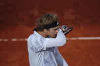 Germany's Alexander Zverev leaves after losing the fourth round match of the French Open tennis tournament against Italy's Jannik Sinner at the Roland Garros stadium in Paris, France, Sunday, Oct. 4, 2020. (AP Photo/Christophe Ena)