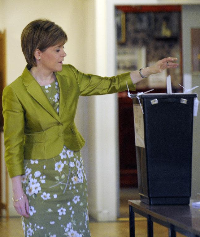 Nicola Sturgeon casts her vote at the Broomhoouse Community Hall in Glasgow, Scotland, on May 7, 2015