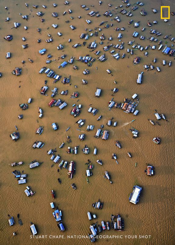 An aerial view of the Chong Kneas floating village on Tonle Sap Lake, Cambodia. The lake's seasonal cycles are threatened by changing rainfall patterns and rising temperatures.