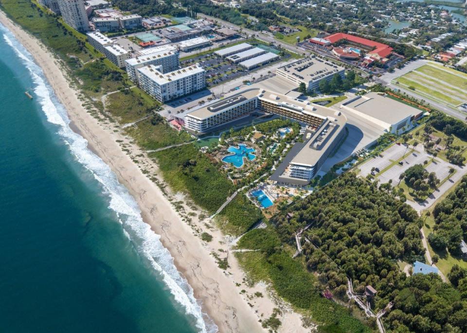 This is an artist rendering of what the U-shaped Westin Cocoa Beach Resort and Spa and its conference center would look like in an aerial view.