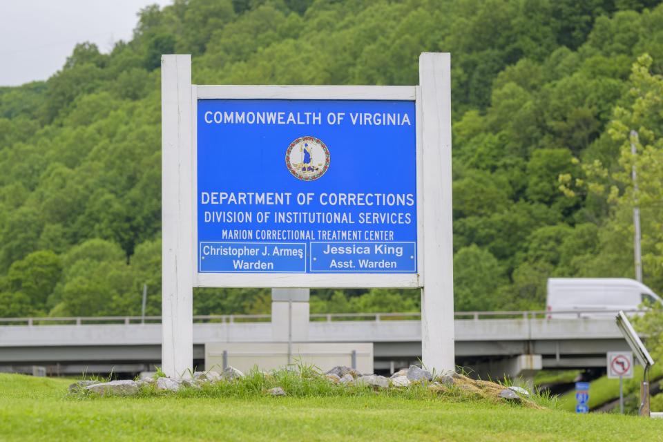 The Marion Correctional Treatment Center entrance sign is shown Thursday, May 16, 2024, in Marion, Va. A lawsuit over a Virginia prison inmate's death has raised broader questions about conditions at the lockup, and newly obtained records are now providing further insights. The records obtained by The Associated Press show inmates at the Marion Correctional Treatment Center, which houses predominantly mentally ill offenders, were hospitalized for hypothermia at least 13 times in three years. (AP Photo/Earl Neikirk)