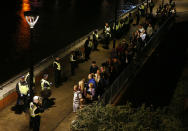 <p>Police officers stand with people evacuated from the area after an incident near London Bridge in London, Britain June 4, 2017. (Neil Hall/Reuters) </p>