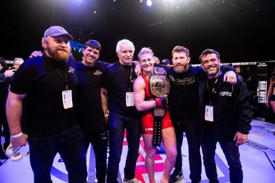 PFL champ Kayla Harrison with some of her American Top Team coaches including Mike Brown and Steve Mocco. 