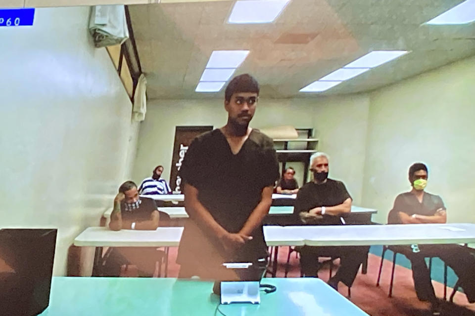 Jacob Borge appears in court for an arraignment via video in Honolulu, Thursday, April 27, 2023. Borge pleaded not guilty to murder and other charges stemming from a shooting at a Hawaii cockfight. Borge was indicted on 11 felony charges including murder and attempted murder stemming from the April 15, 2023, shooting that left three other people wounded at the illegal cockfight. (AP Photo/Jennifer Sinco Kelleher)