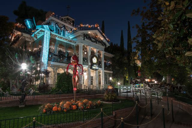 <p>Joshua Sudock/Disneyland Resort</p> Disneyland's Haunted Mansion Holiday