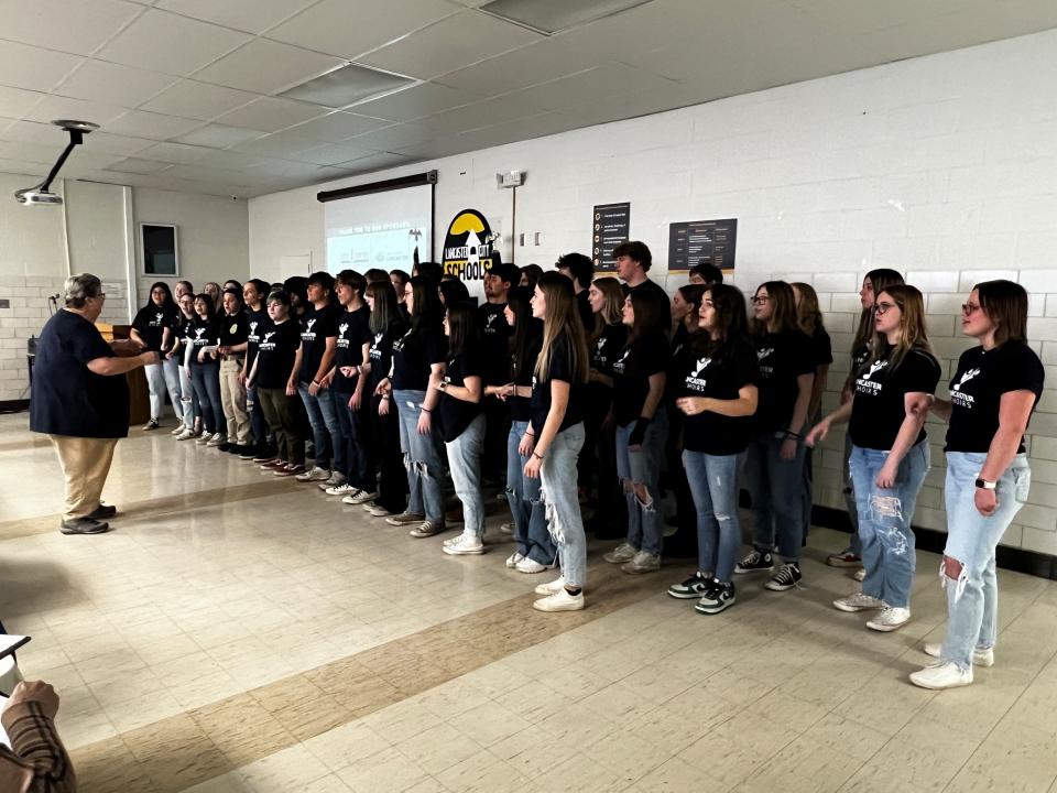 Lancaster High School choir members sing during Wednesday's Lancaster-Fairfield County Career Center. The event was at the Stanbery Career Center.