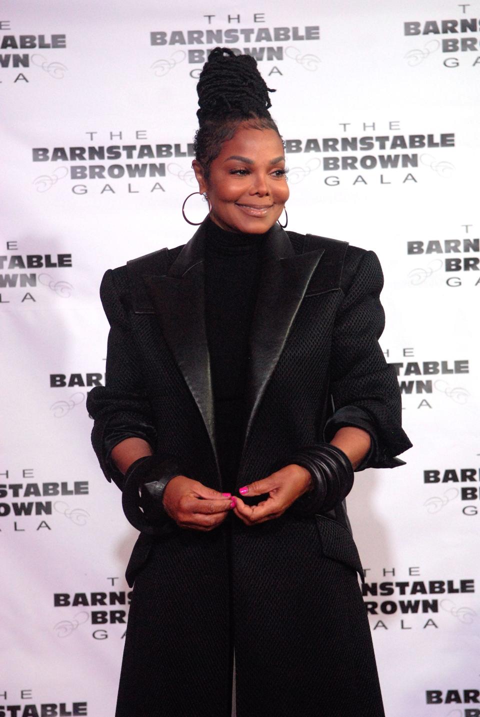 Singer Janet Jackson poses for a photo on the red carpet at the Barnstable Brown Gala Friday night.  Maggie Huber/Special to Courier-Journal