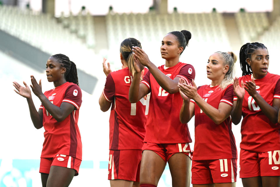 SAINT-ETIENNE, FRANCE - JULY 25: Players of Team Canada acknowledge the fans after the Women's group A match between Canada and New Zealand during the Olympic Games Paris 2024 at Stade Geoffroy-Guichard on July 25, 2024 in Saint-Etienne, France. (Photo by Tullio M. Puglia/Getty Images)