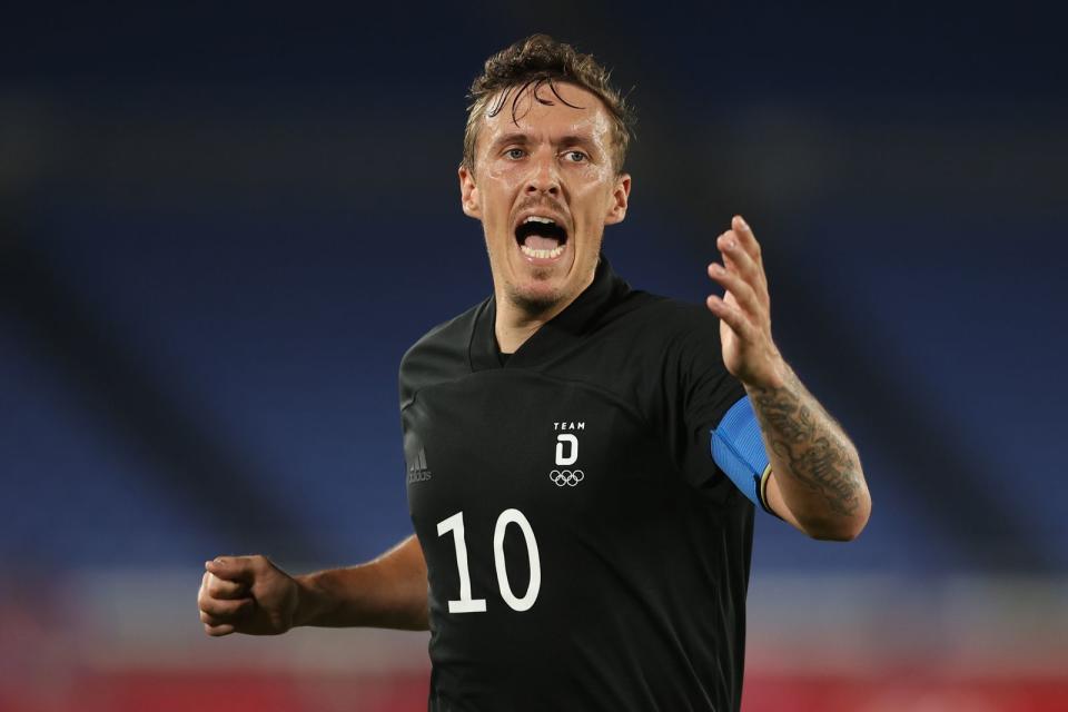 Als Kapitän tat sich Max Kruse vor seinem Antrag auch beim Spiel gegen Saudi-Arabien hervor. Die deutsche Elf gewann nach einem harten Kampf in Unterzahl etwas glücklich, aber  nicht unverdient mit 3:2. (Bild: 2021 Getty Images/Francois Nel)