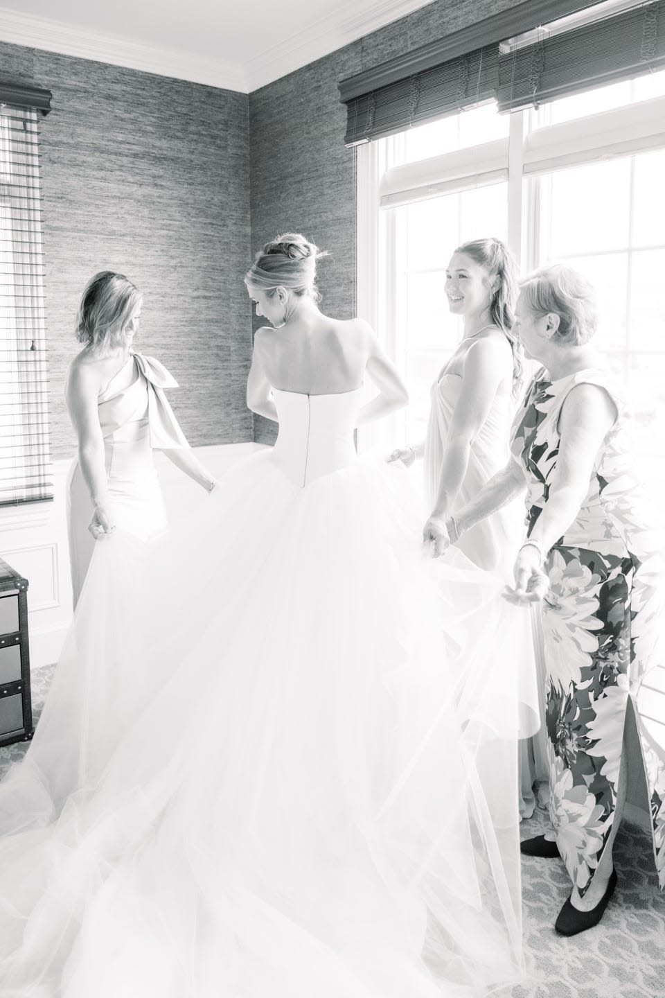 a bride getting dressed