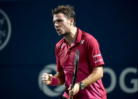 Jul 26, 2016; Toronto, Ontario, Canada; Stan Wawrinka of Switzerland reacts after winning the first set against Mikhail Youzhny of Russia on day two of the Rogers Cup tennis tournament at Aviva Centre. Mandatory Credit: Dan Hamilton-USA TODAY Sports