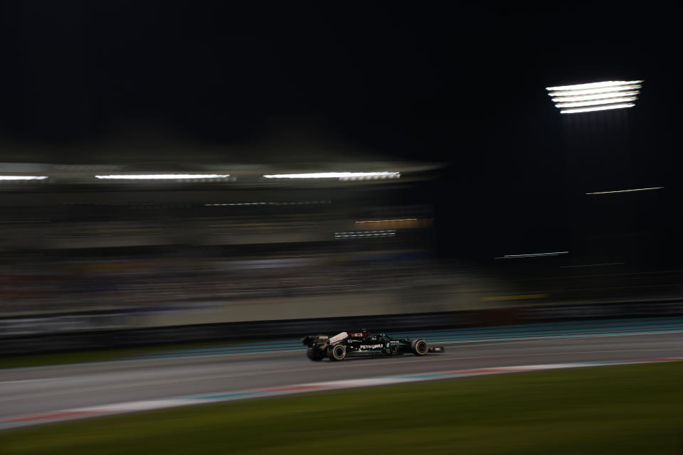 Mercedes driver Lewis Hamilton of Britain in action during the Formula One Abu Dhabi Grand Prix in Abu Dhabi, United Arab Emirates, Sunday, Dec. 12, 2021, (AP Photo/Hassan Ammar)