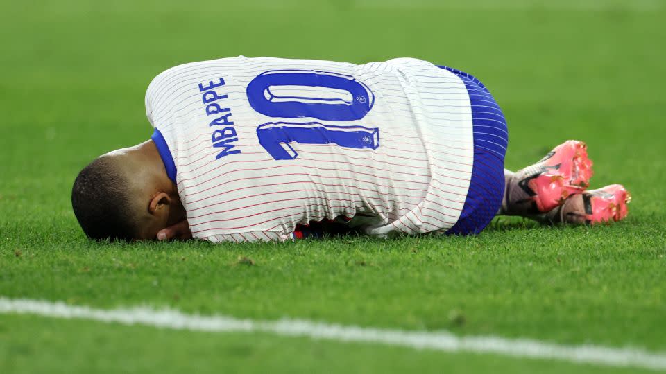 Mbappé was substituted in the 90th minute after colliding with an Austrian defender. - Dean Mouhtaropoulos/Getty Images