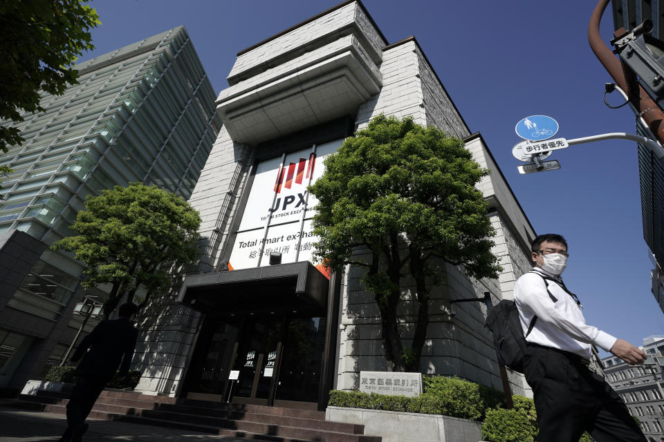 Tokyo Stock Exchange building is seen Friday, Oct. 2, 2020, in Tokyo. Tokyo's market resumed trading Friday after a full-day outage due to a malfunction in its computer systems. (AP Photo/Eugene Hoshiko)