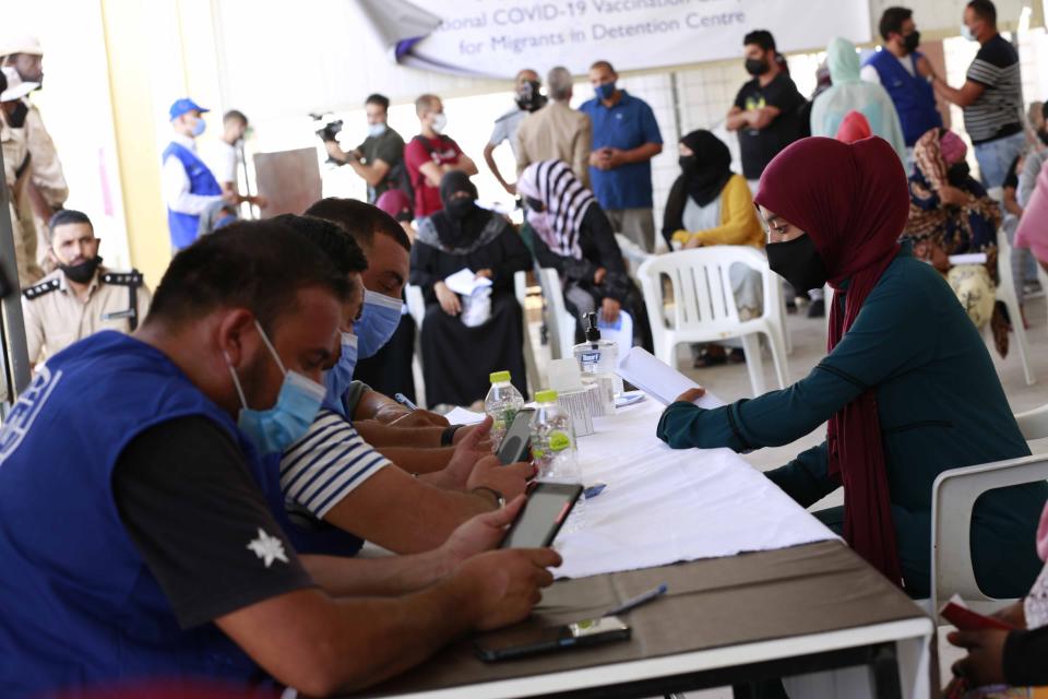 A vaccination campaign against the coronavirus is underway at a Tripoli shelter for migrants, organized jointly by the Libyan center for disease control and the International Organization for Migration. in Tripoli, Libya, Wednesday Oct. 6, 2021. (AP Photo/Yousef Murad)