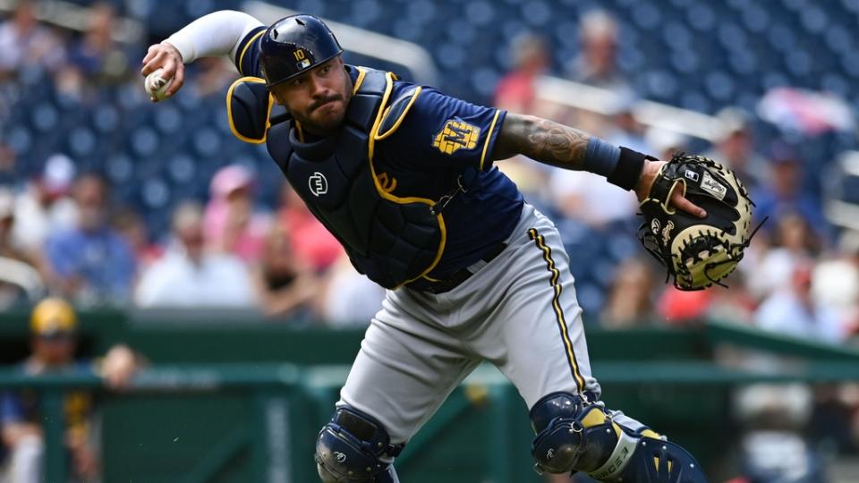 Milwaukee Brewers catcher Omar Narvaez (10) throws to first base on Washington Nationals second baseman Cesar Hernandez (not pictured) fifth inning infield hit at Nationals Park