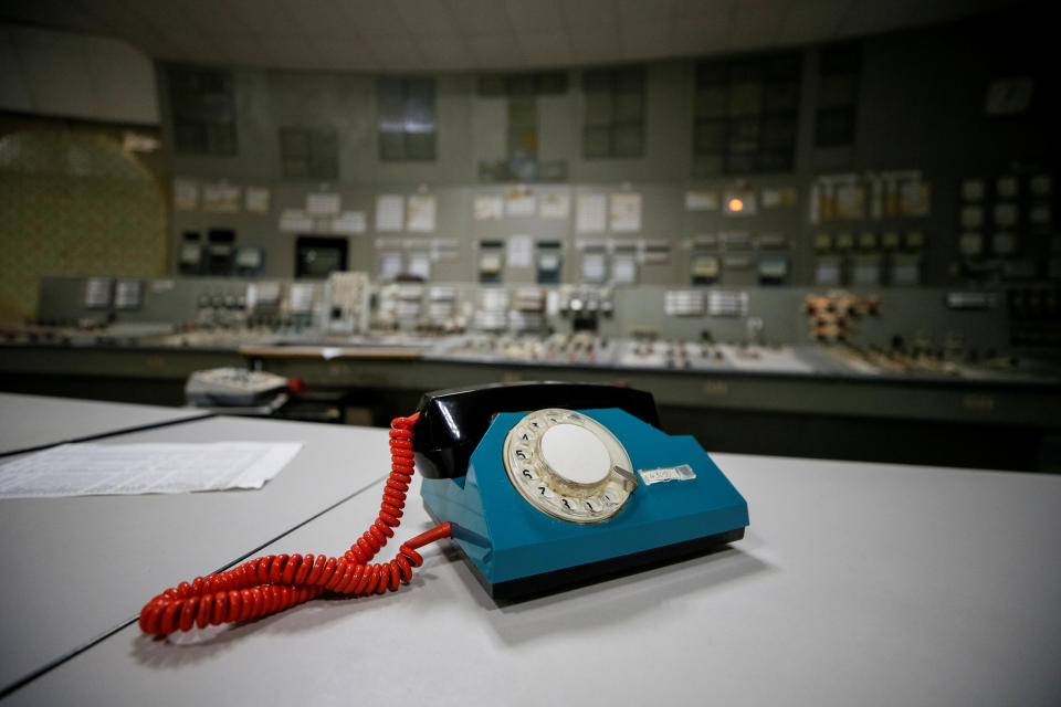 <p>A telephone is seen in a control center of the stopped third reactor at the Chernobyl nuclear power plant in Chernobyl, Ukraine, April 20, 2018. (Photo: Gleb Garanich/Reuters) </p>