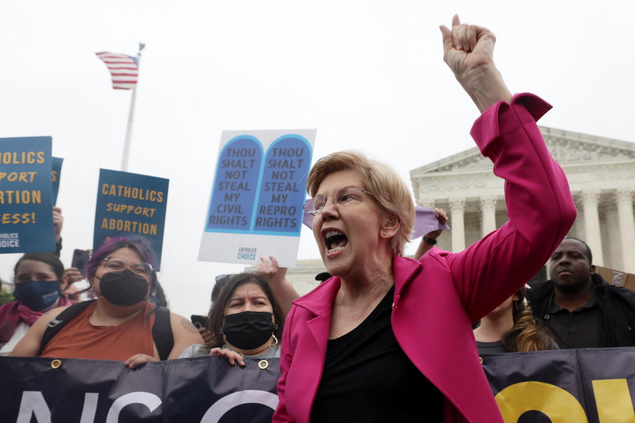 U.S. Senator Elizabeth Warren (D-MA) joins demonstrators during a protest outside the U.S. Supreme Court, after the leak of a draft majority opinion written by Justice Samuel Alito preparing for a majority of the court to overturn the landmark Roe v. Wade abortion rights decision later this year, in Washington, U.S. May 3, 2022. REUTERS/Evelyn Hockstein